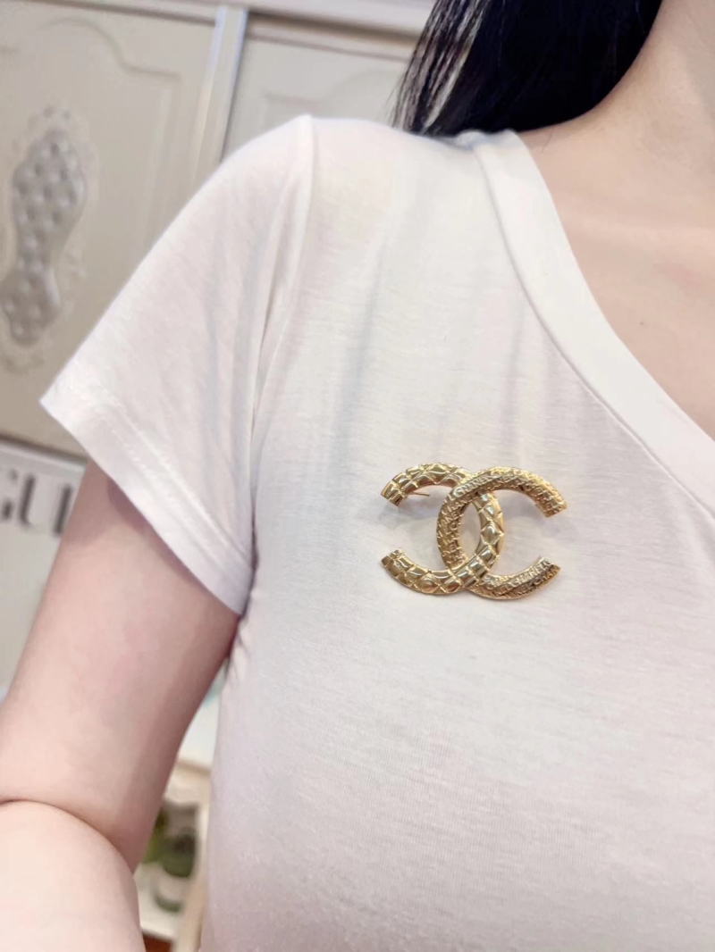 Ch**el brooches